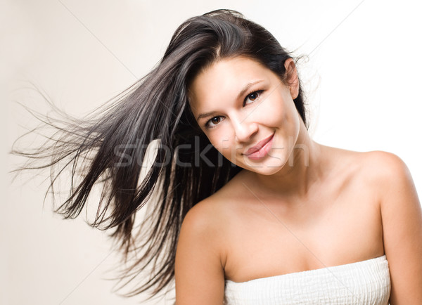Beauty shot of brunette with flowing hair. Stock photo © lithian
