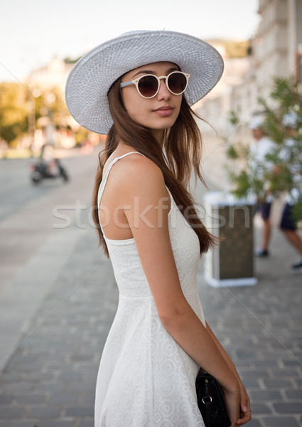 Stylish young tourist woman. Stock photo © lithian