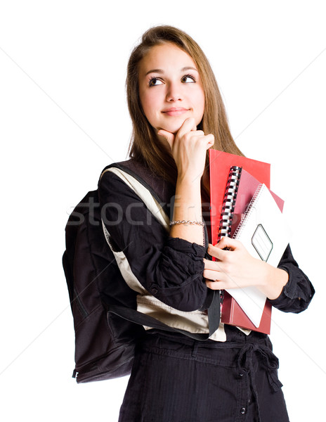 Cute young student girl pondering. Stock photo © lithian