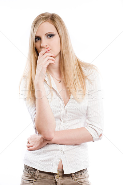 Beautiful young blond pondering. Stock photo © lithian