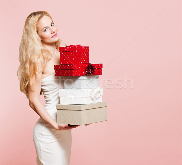 Young blond woman with gift boxes. Stock photo © lithian