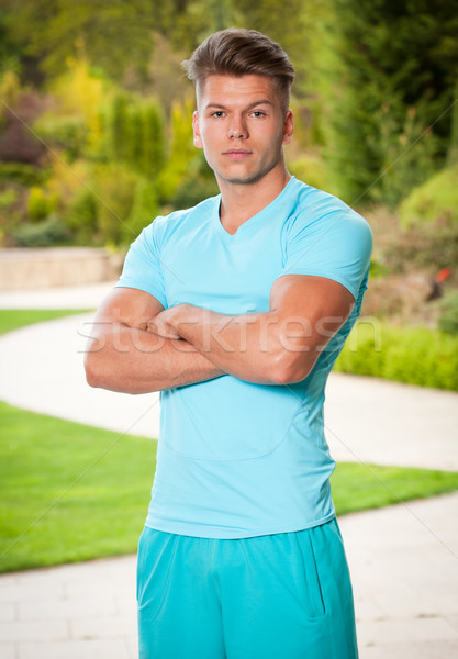 Silne dopasować portret młody człowiek sportu zielone Zdjęcia stock © lithian