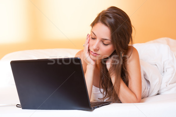 Stock photo: Brunette beauty with her laptop.