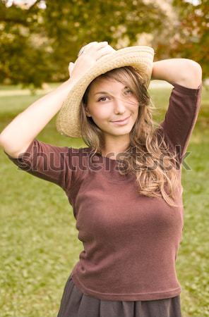 Fiatal barna hajú lány természet tavasz pózol Stock fotó © lithian