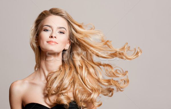 Blond beauty with healthy hair. Stock photo © lithian