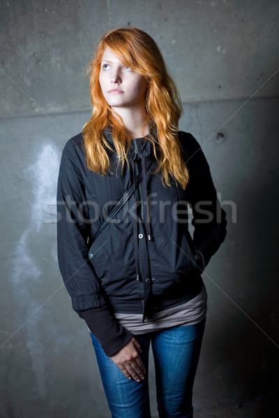 loneliness - moody portrait of a beautiful young redhead girl. Stock photo © lithian