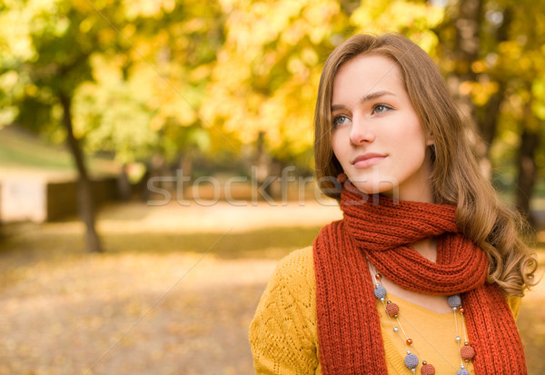 Stock photo: Fall fashion girl pondering.