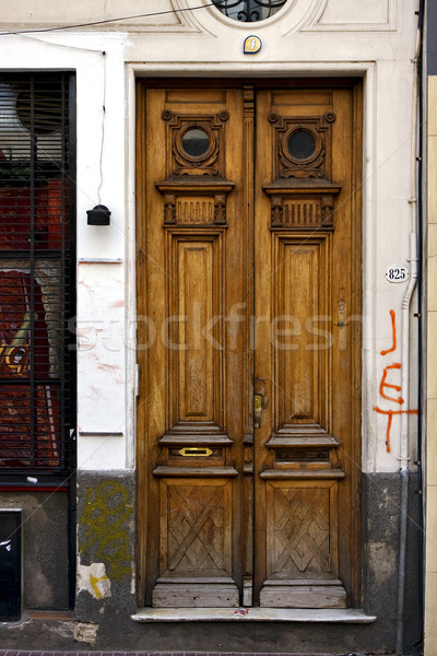 brown wood old door and a grate Stock photo © lkpro