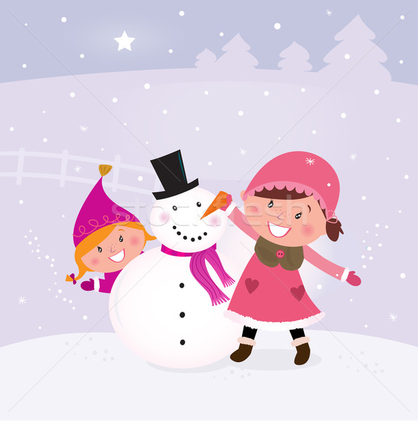 Winter and christmas: Two happy children making snowman  Stock photo © lordalea