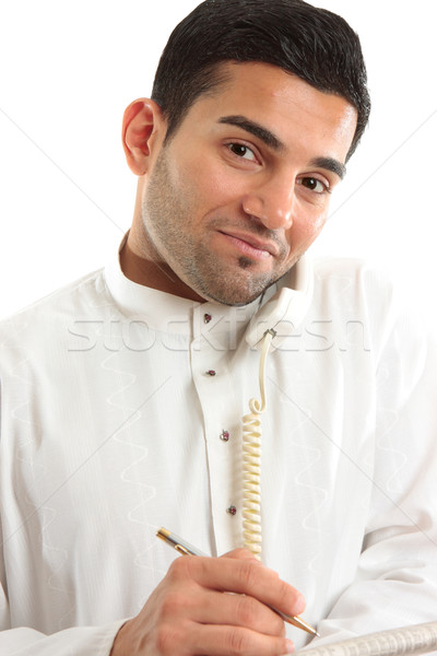 Businessman on phone call with newspaper Stock photo © lovleah