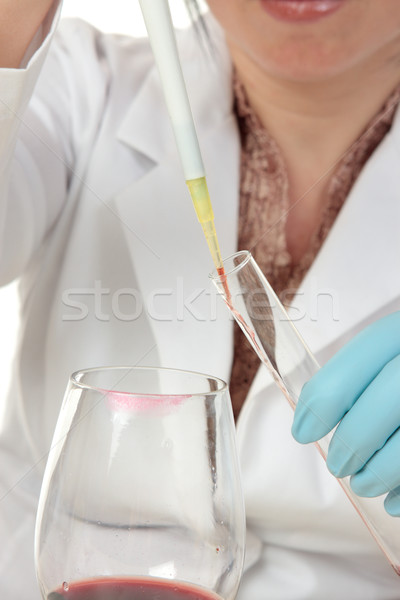 Stock photo: Forensic scientist taking sample from glass