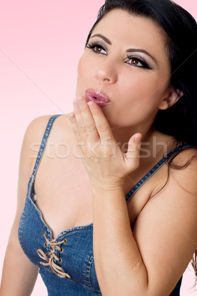 Woman blowing soft kisses Stock photo © lovleah