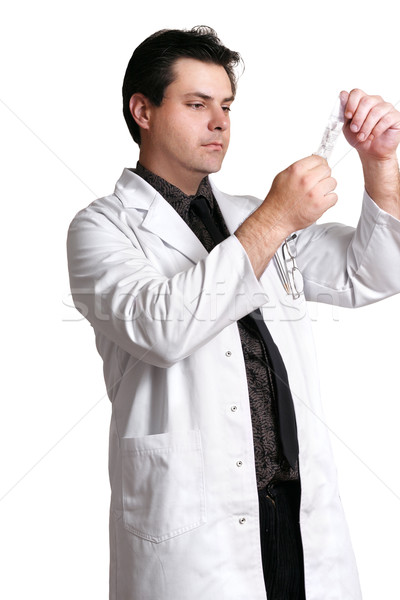 Doctor with saline solution Stock photo © lovleah