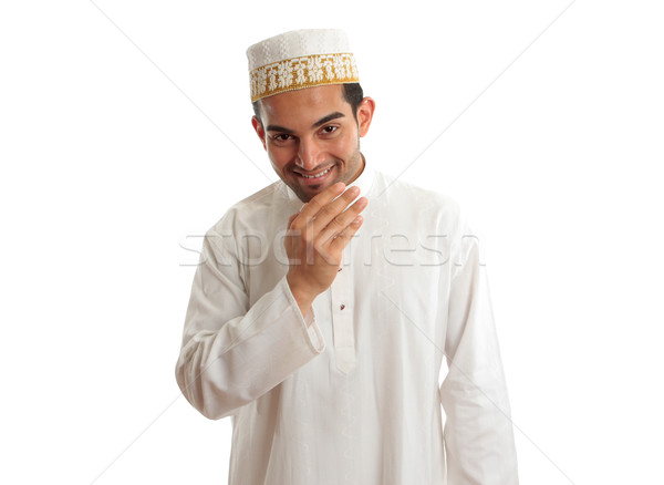 Smiling ethnic man in traditional robe and topi Stock photo © lovleah
