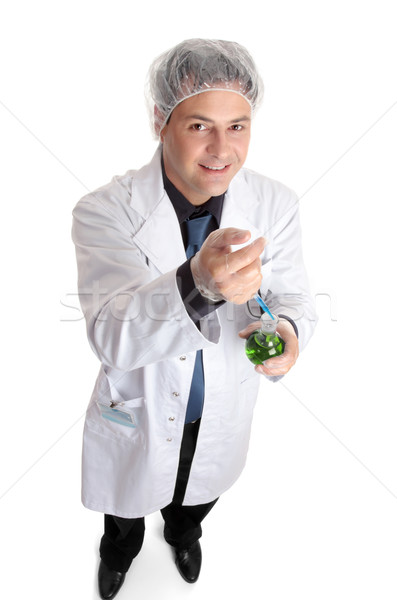 Scientist adding measured sample to flask Stock photo © lovleah