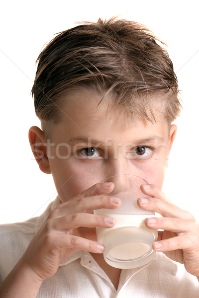 Child drinking glass of milk Stock photo © lovleah