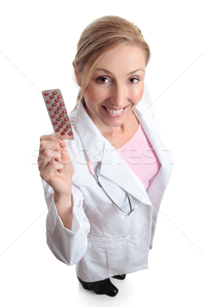 Doctor or nurse with medicine Stock photo © lovleah