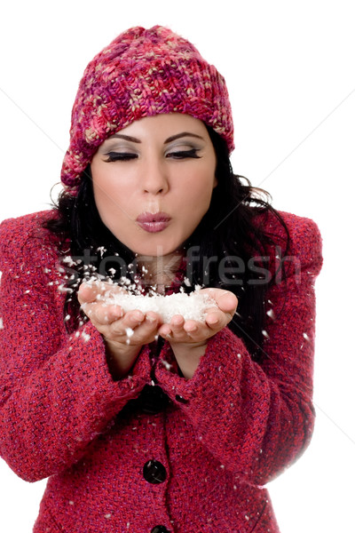 Csinos nő fúj hó pelyhek tél nő Stock fotó © lovleah
