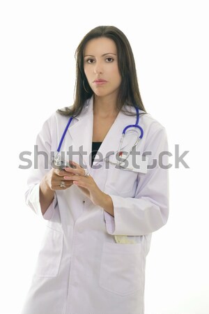 Doctor or Nurse using mobile phone. Stock photo © lovleah