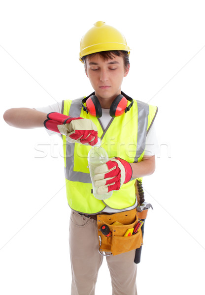 Young builder drinking a bottle of water Stock photo © lovleah