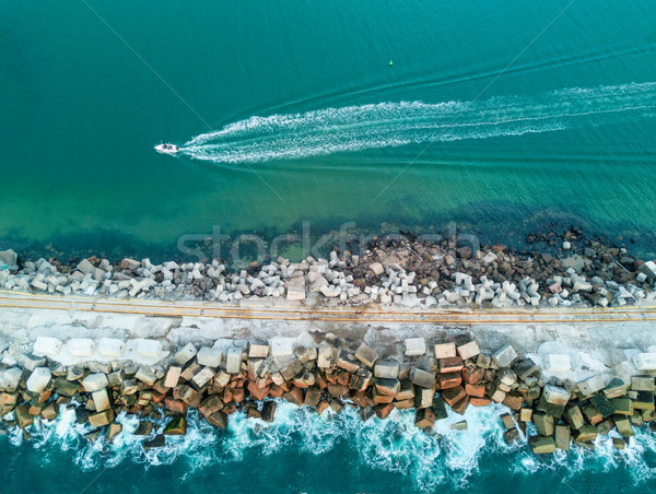 A speed boat and a breakwall aerial view Stock photo © lovleah