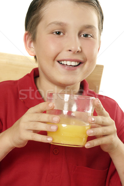 A child holding orange juice Stock photo © lovleah