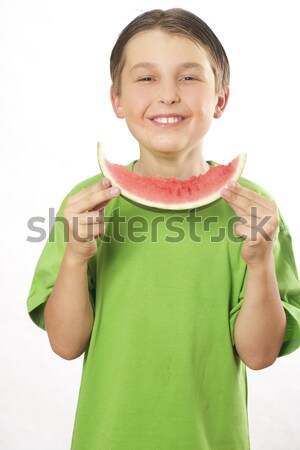 Smiling boy eating summer fruit watermelon Stock photo © lovleah