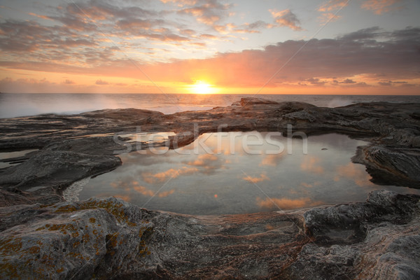 Stock photo: Sunrise over the ocean to Yena Bay