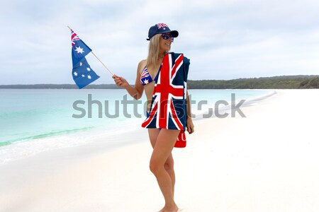 Marriage Equality  Joyous woman running along the beach with a r Stock photo © lovleah