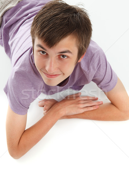 Smiling boy looking up Stock photo © lovleah