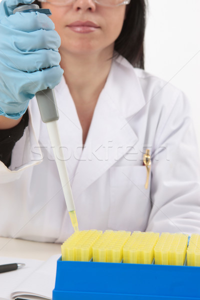 Scientist using pipette Stock photo © lovleah