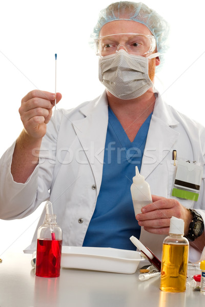 Forensic worker or scientist testing for substances Stock photo © lovleah