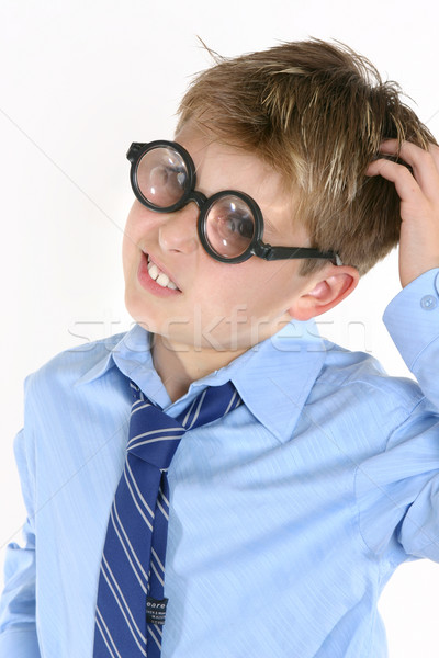 School student in comical spectacles scratching head Stock photo © lovleah