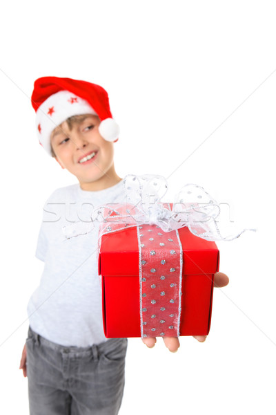 Boy with present looking sideways Stock photo © lovleah