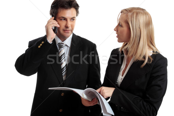 Stock photo: Business people discuss report
