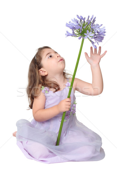 Little girl playing with flower Stock photo © lovleah