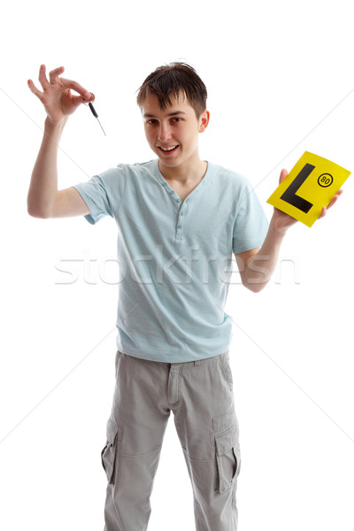 Teenager holding car keys and L plates Stock photo © lovleah