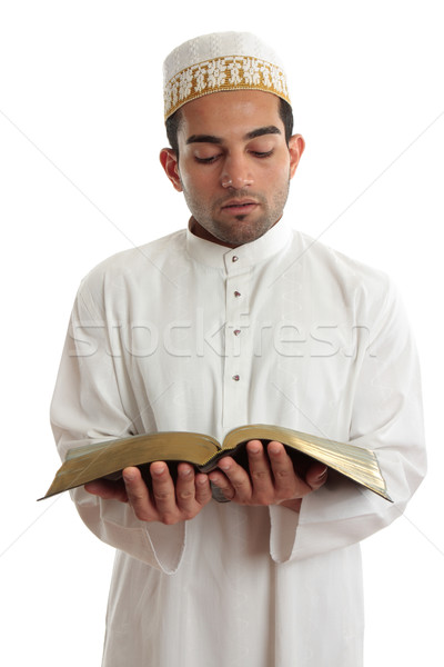 Stock photo: Man reading a religious or other book