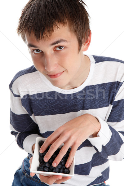 Stock photo: Blueberries superfood - boy eating blueberries