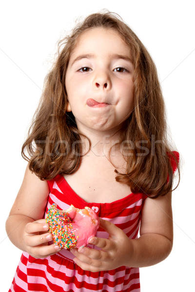Girl eating doughnut licking lips Stock photo © lovleah
