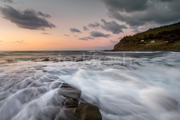 Dawn sky rock flows Garie Beach Stock photo © lovleah