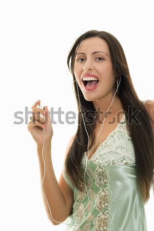 Lopen vrouw muziekspeler brunette luisteren Stockfoto © lovleah