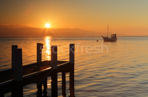 Ködös reggel napfelkelte arany narancs csónak Stock fotó © lovleah