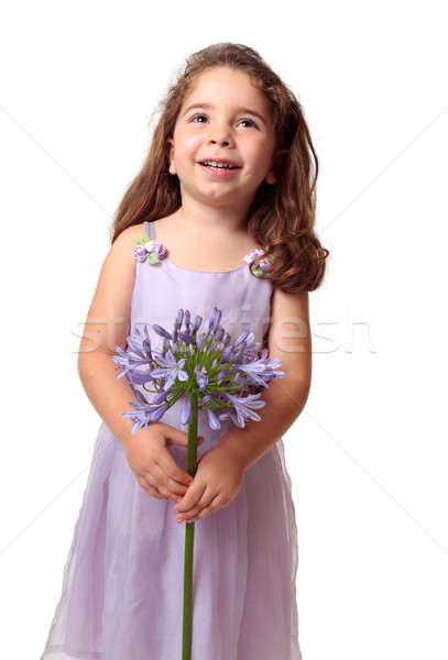 Pretty girl with beautiful flower smiling Stock photo © lovleah