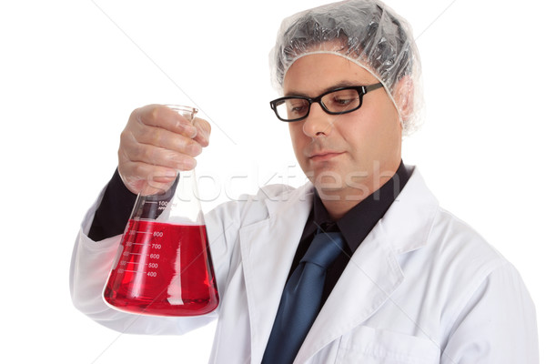 Chemist carrying large flask Stock photo © lovleah
