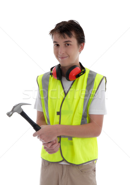 Young teen apprentice builder holding hammer Stock photo © lovleah