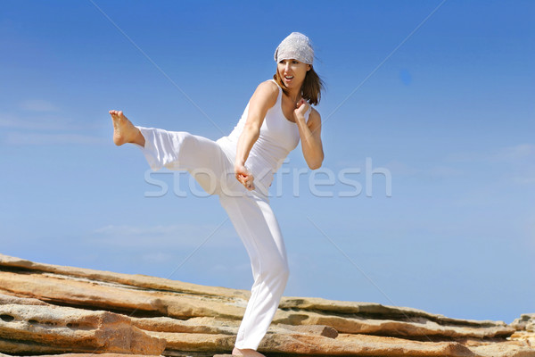 Self defence karate kick Stock photo © lovleah