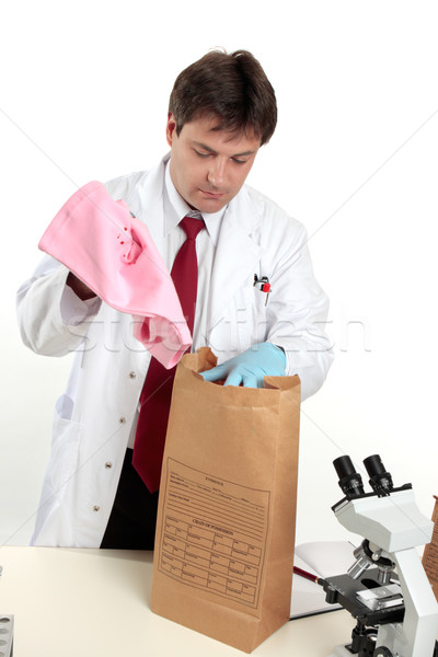 Forensic scientist with evidence Stock photo © lovleah