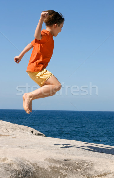 Jumping boy child Stock photo © lovleah