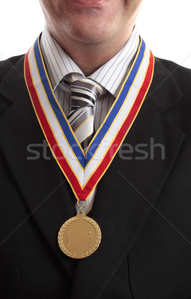 In primul rand afaceri de succes om de afaceri recunoastere medalia de aur Imagine de stoc © lovleah